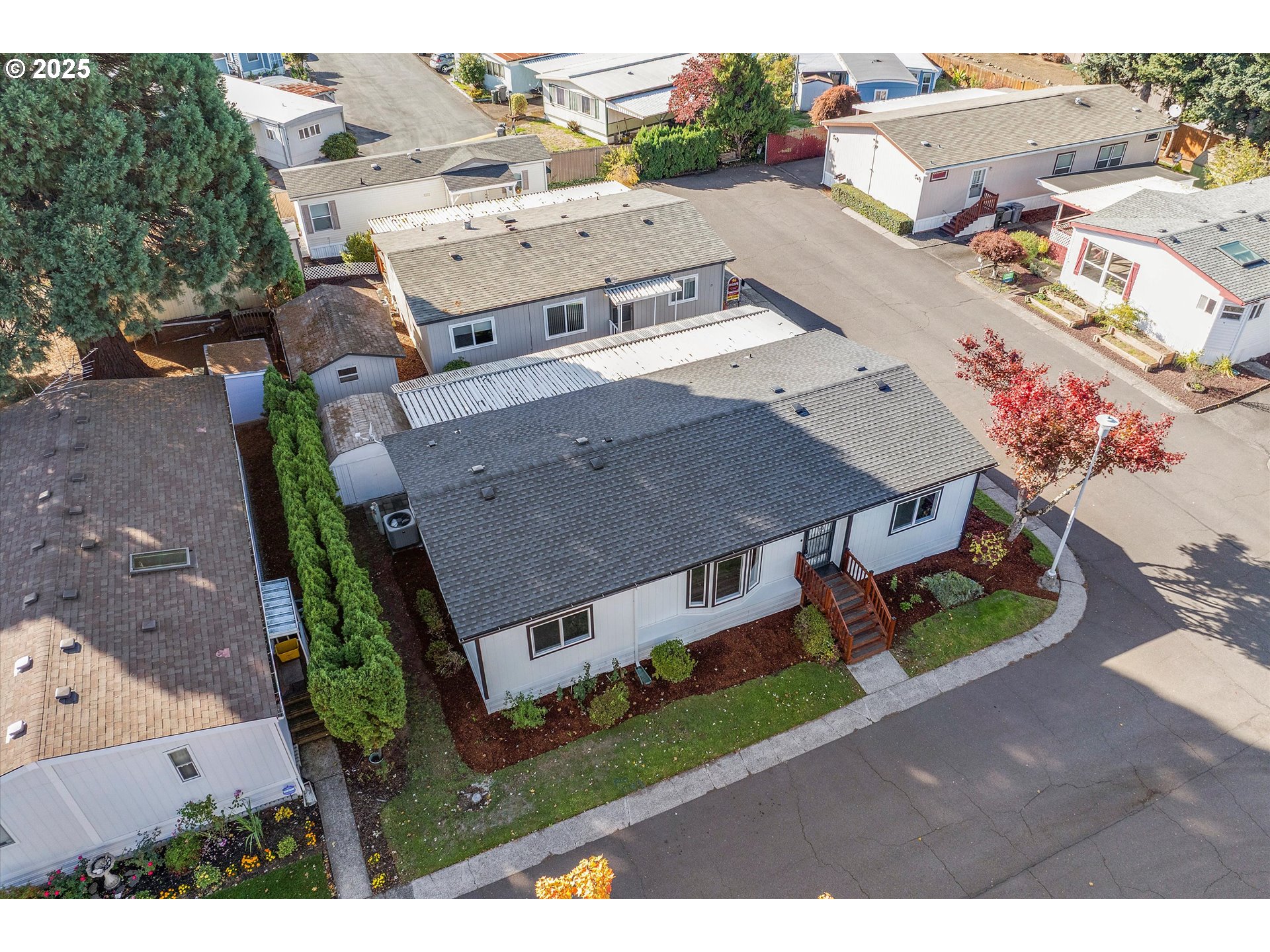 835 Southeast 1st Avenue, Unit 17 Canby, OR 97013 - Photo 29 of 33 an aerial view of a house with a garden
