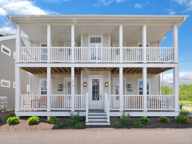 front view of a house with a deck