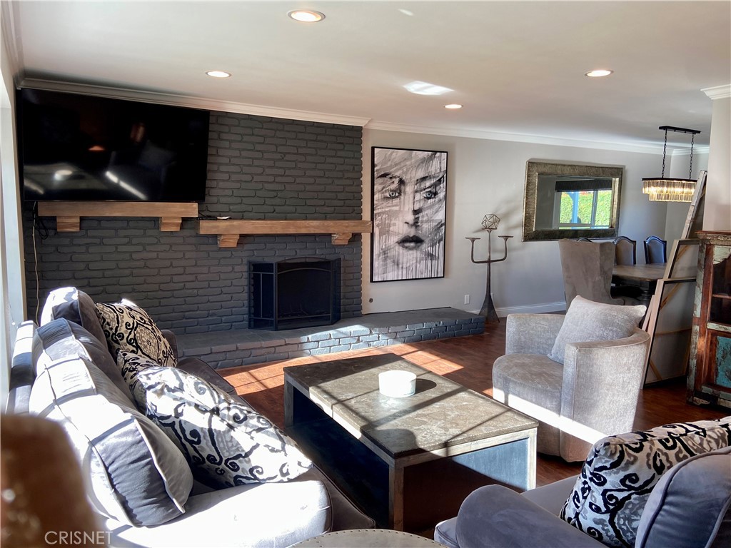 2163 Cheam Avenue Simi Valley, CA 93063 - Photo 16 of 43 a living room with furniture and a flat screen tv