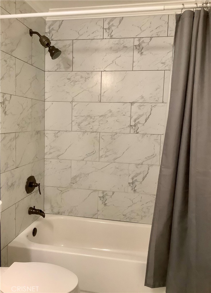 2163 Cheam Avenue Simi Valley, CA 93063 - Photo 28 of 43 a bathroom with a bathtub and shower