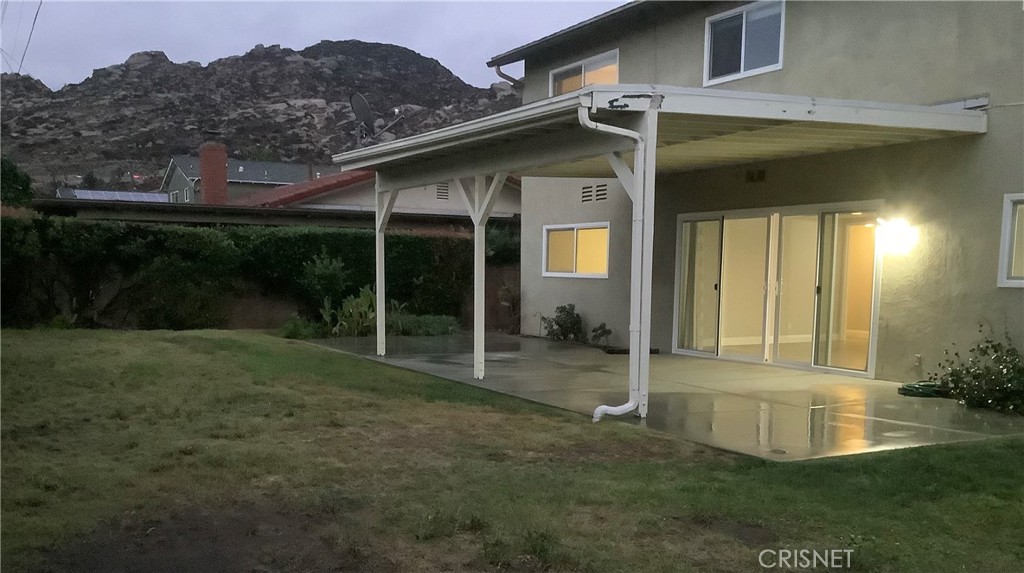 2163 Cheam Avenue Simi Valley, CA 93063 - Photo 31 of 43 a view of a house with a yard