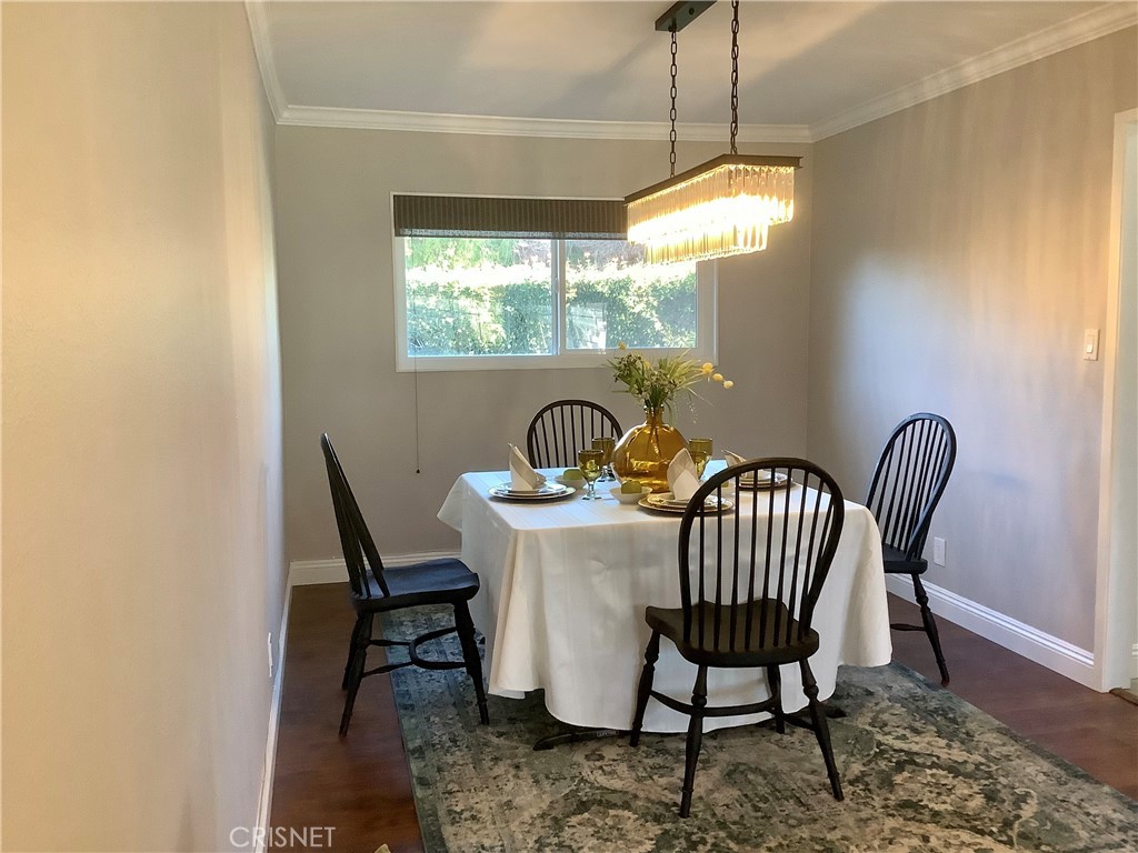 2163 Cheam Avenue Simi Valley, CA 93063 - Photo 6 of 43 a view of a dining room with furniture window and outside view