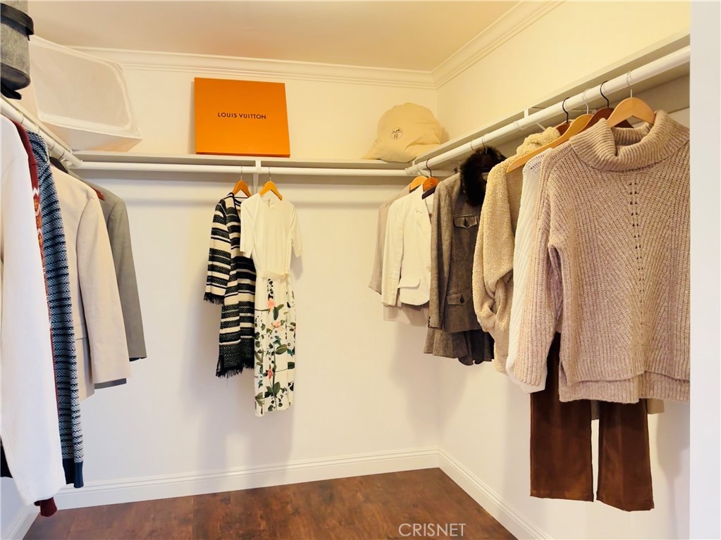 2163 Cheam Avenue Simi Valley, CA 93063 - Photo 9 of 43 a view of walk in closet with clothes and shoes