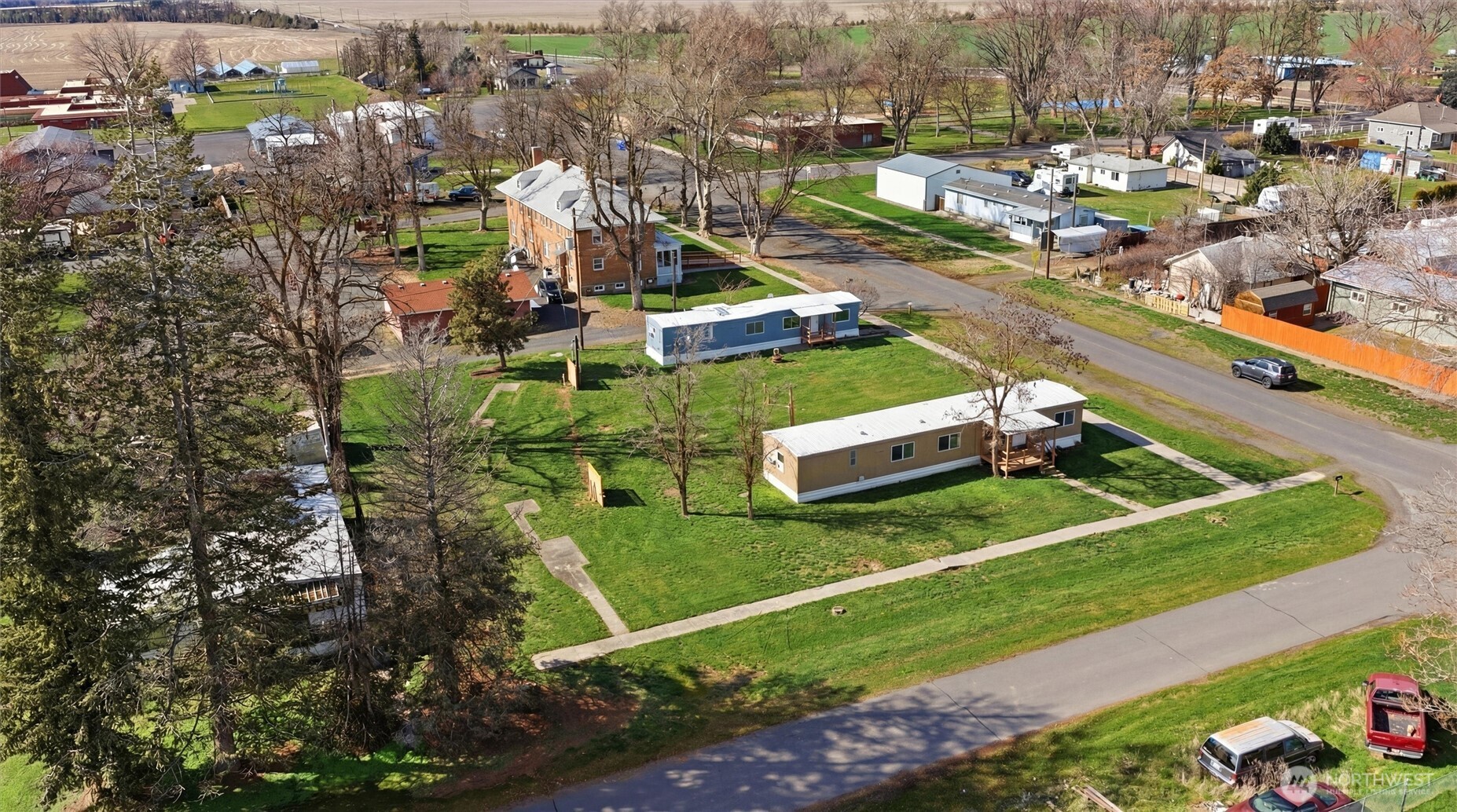 an aerial view of a house with a garden