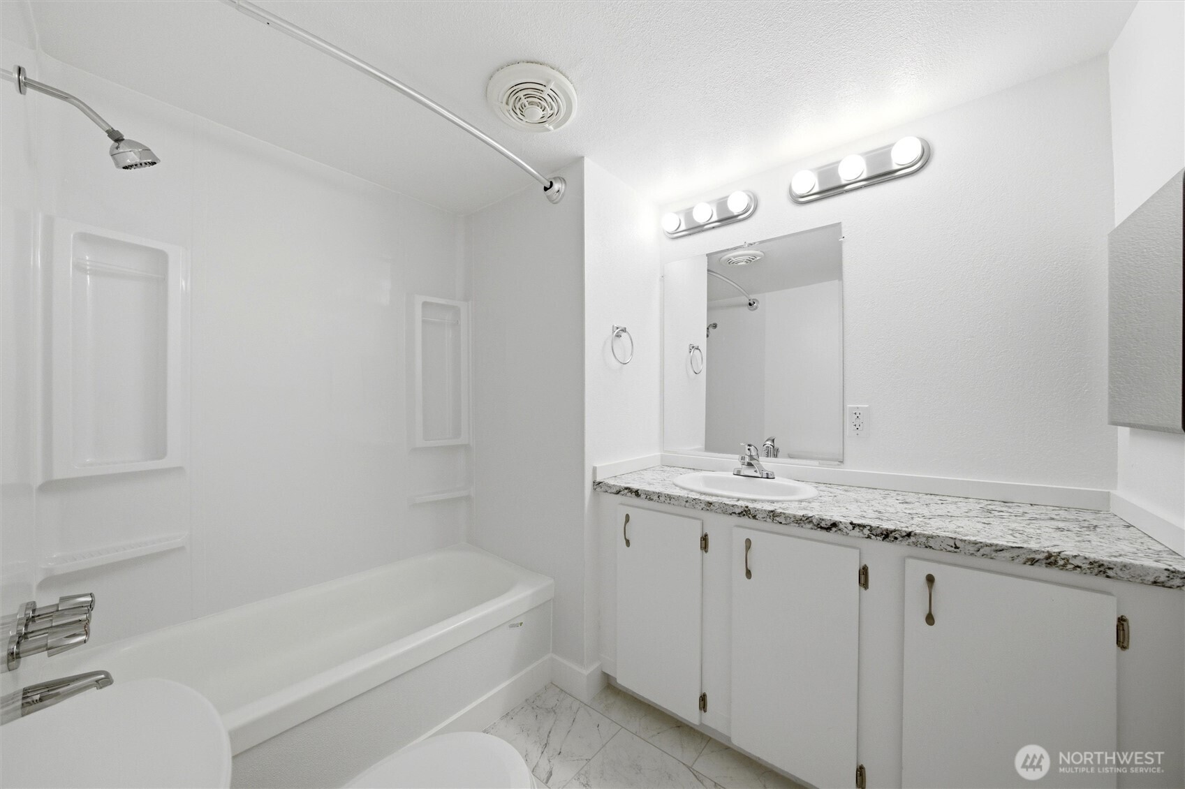 200 West 1st Street Prescott, WA 99348 - Photo 11 of 22 a bathroom with a granite countertop sink and a mirror