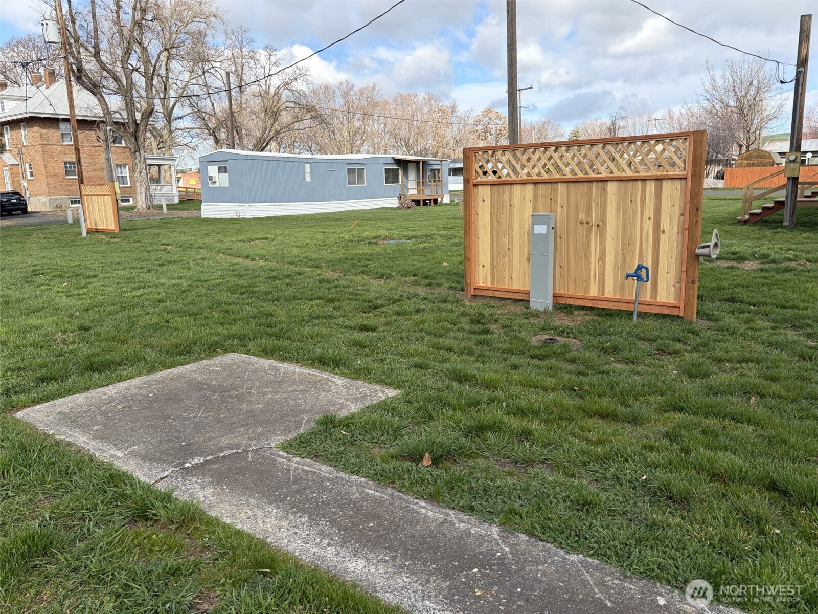 200 West 1st Street Prescott, WA 99348 - Photo 17 of 22 a view of a house with a yard