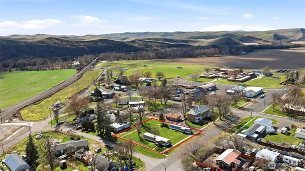 a view of a city with mountains in the background