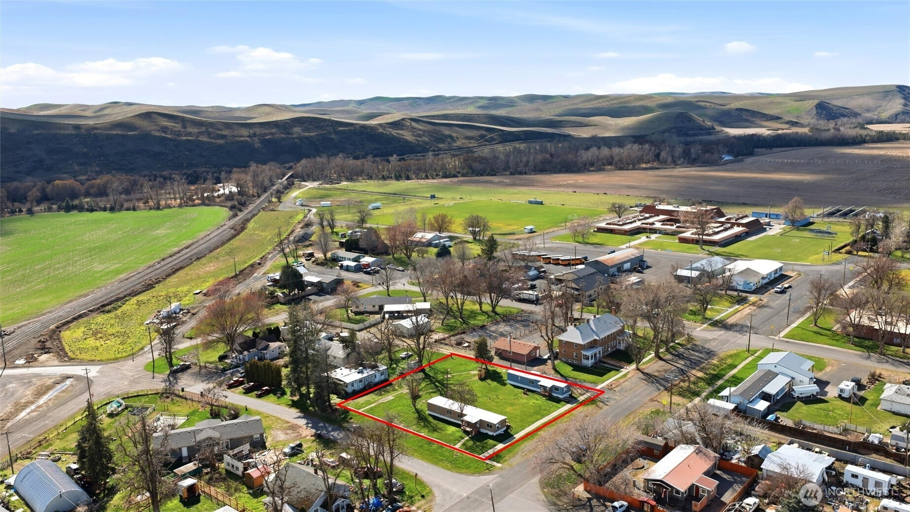 200 West 1st Street Prescott, WA 99348 - Photo 22 of 22 a view of a city with mountains in the background