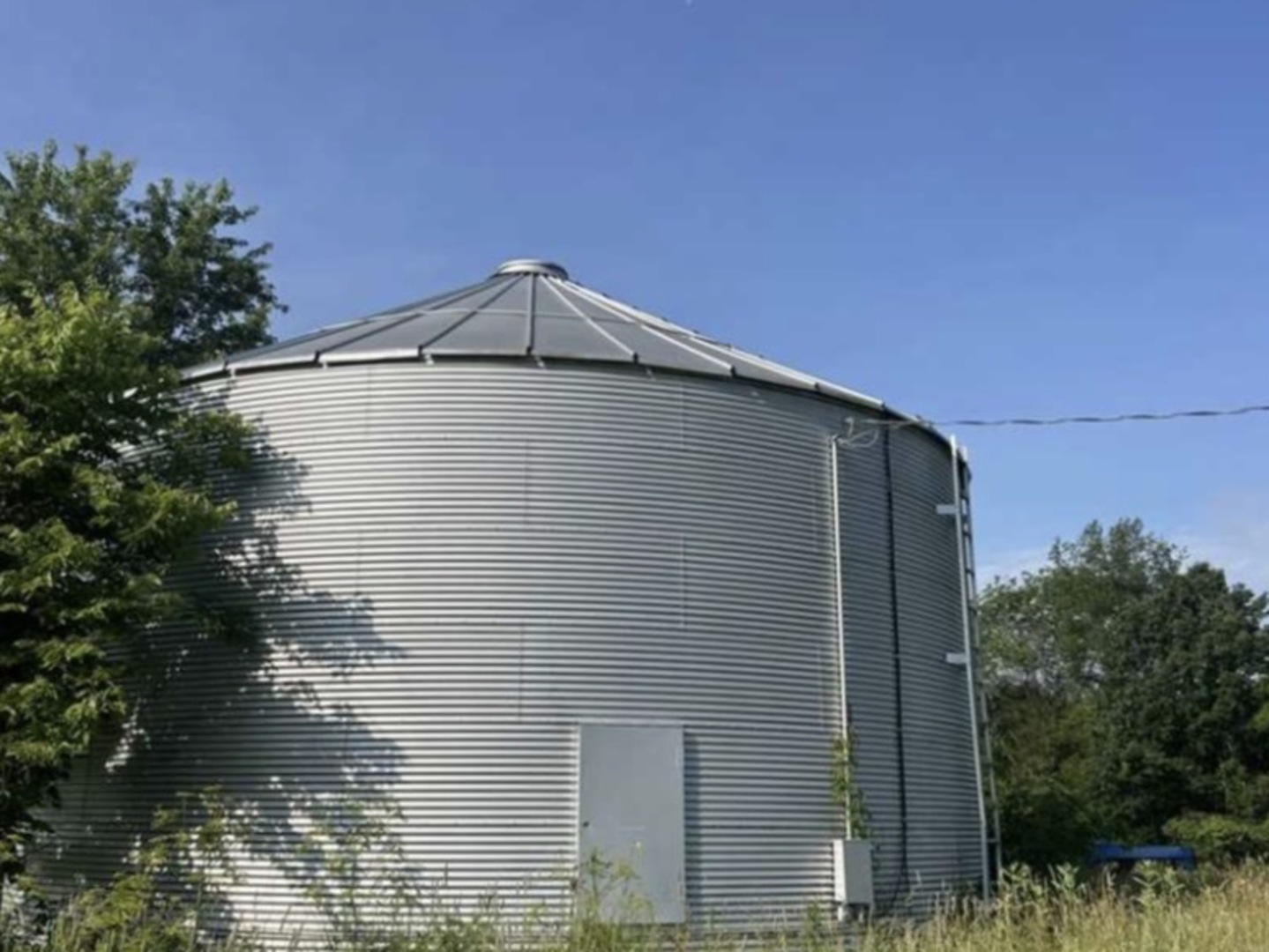 130 N Avenue Versailles, IL 62378 - Photo 3 of 4 a view of a house with a yard