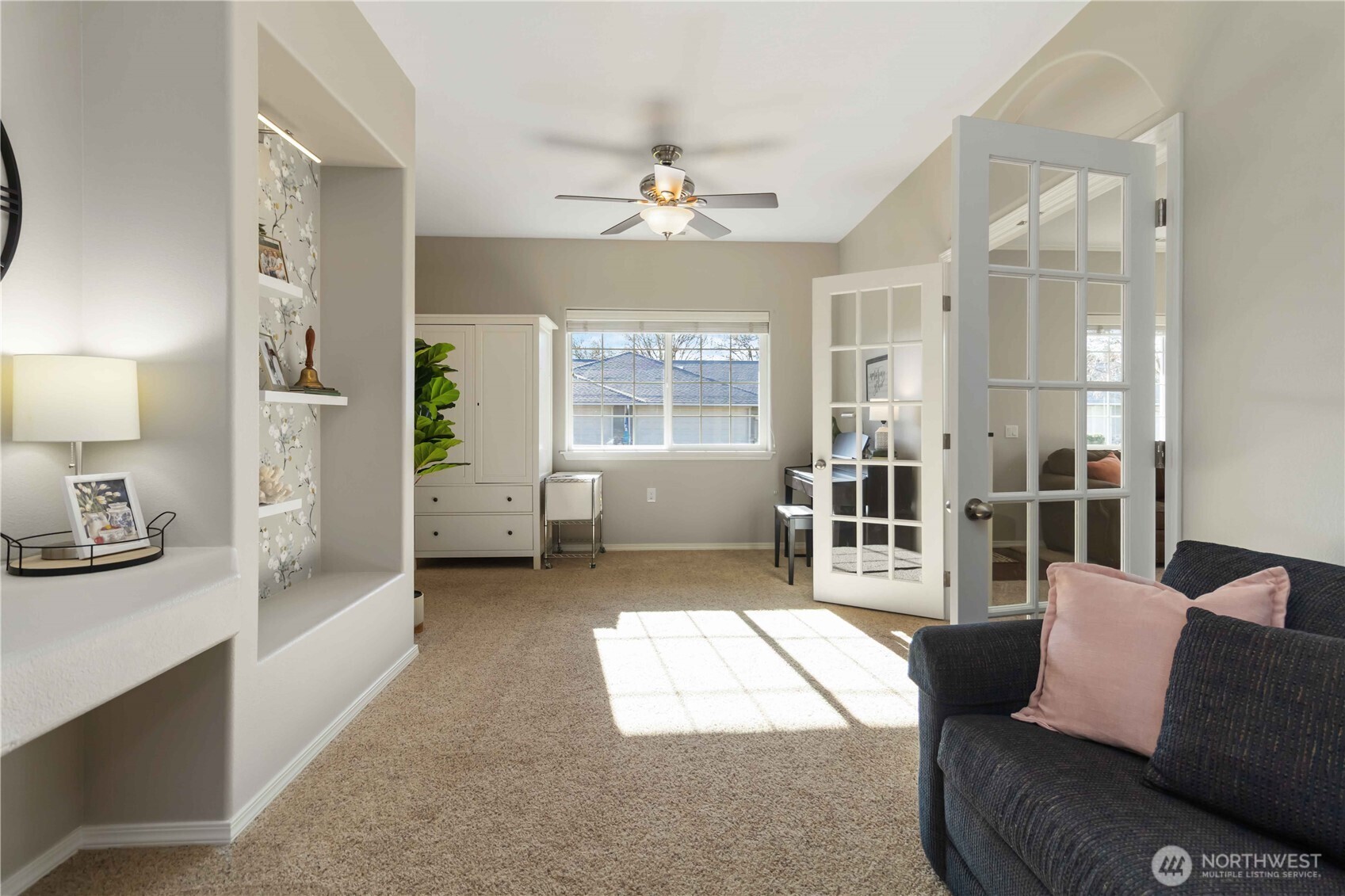5558 Solo Point Drive Longview, WA 98632 - Photo 11 of 40 a living room with furniture and a chandelier