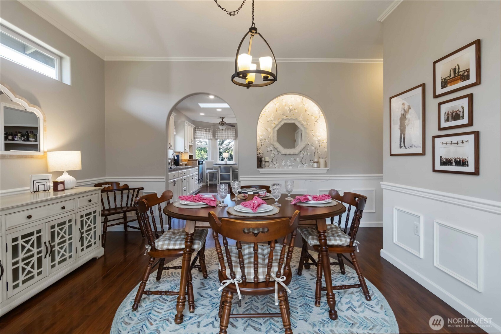 5558 Solo Point Drive Longview, WA 98632 - Photo 13 of 40 a view of a dining room with furniture and a chandelier