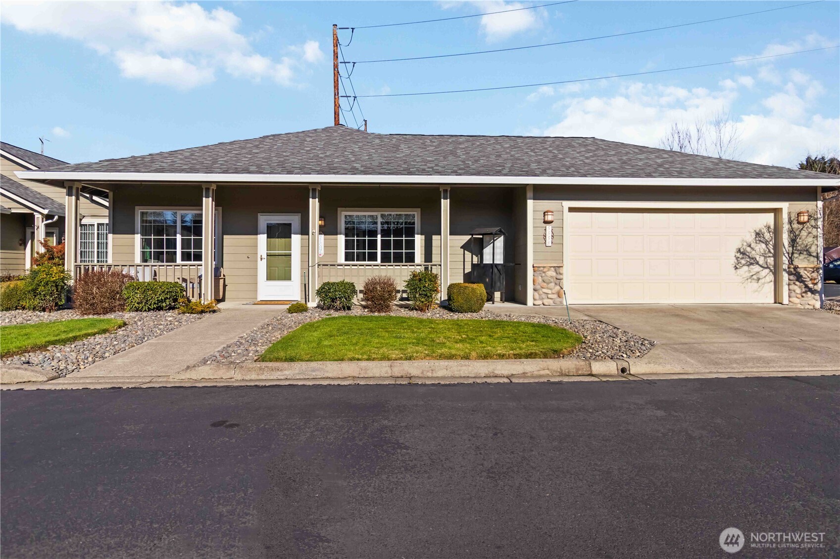 5558 Solo Point Drive Longview, WA 98632 - Photo 2 of 40 a view of a house with a yard and plants