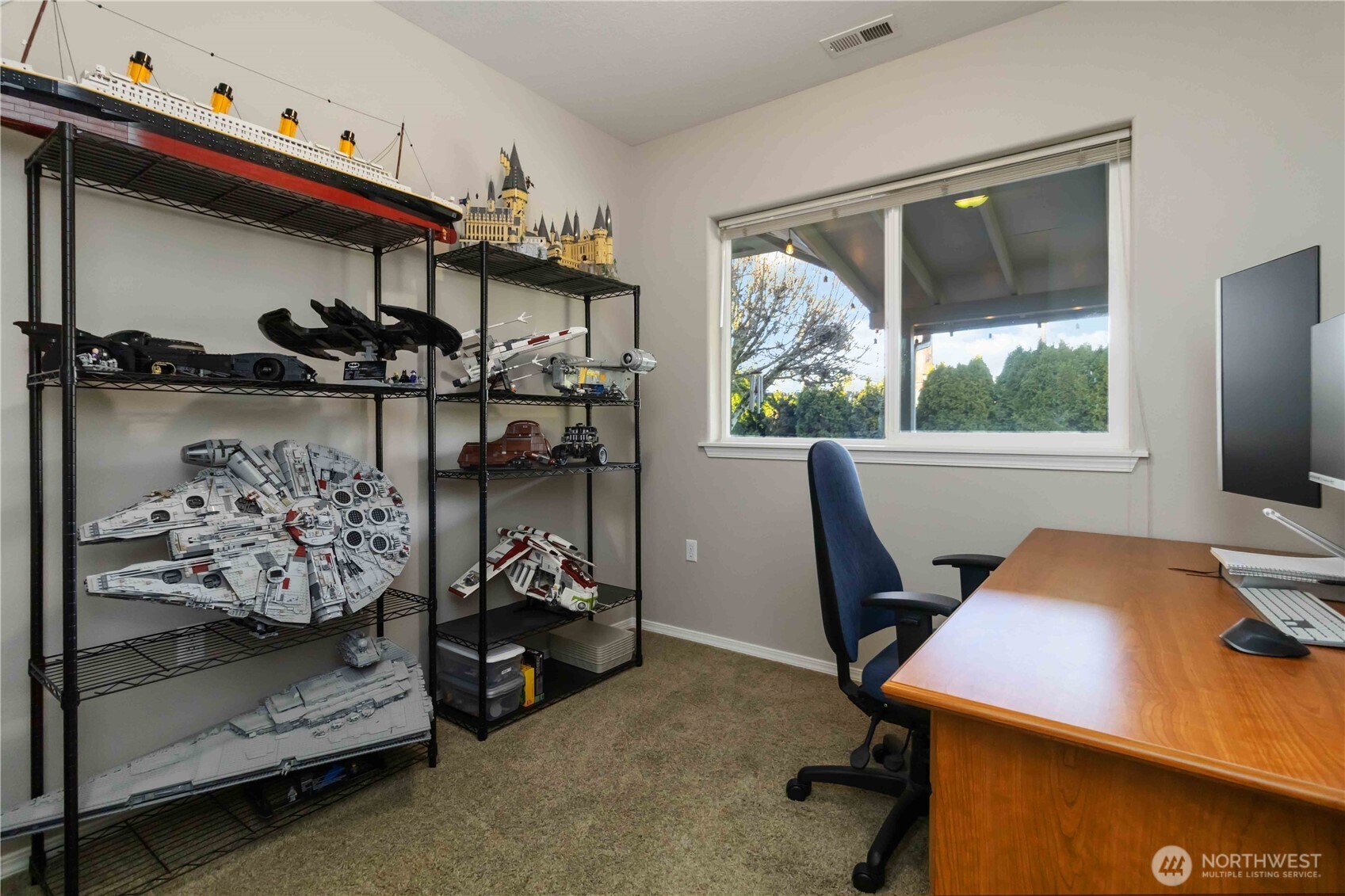 5558 Solo Point Drive Longview, WA 98632 - Photo 24 of 40 a view of a workspace with furniture and a window