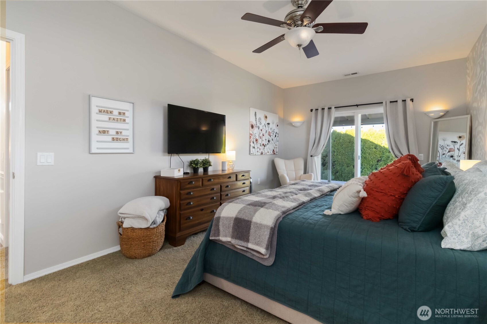5558 Solo Point Drive Longview, WA 98632 - Photo 26 of 40 a bedroom with a bed and a flat screen tv