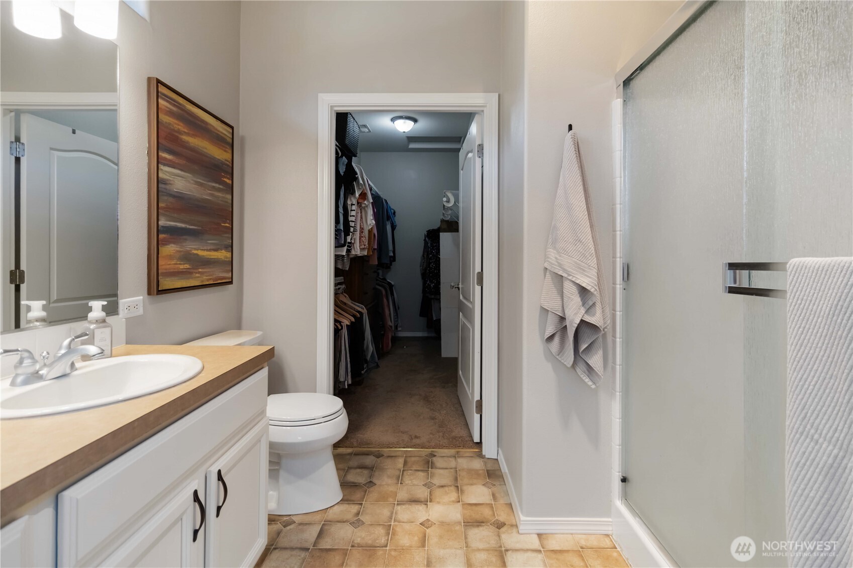 5558 Solo Point Drive Longview, WA 98632 - Photo 29 of 40 a bathroom with a sink a toilet and shower