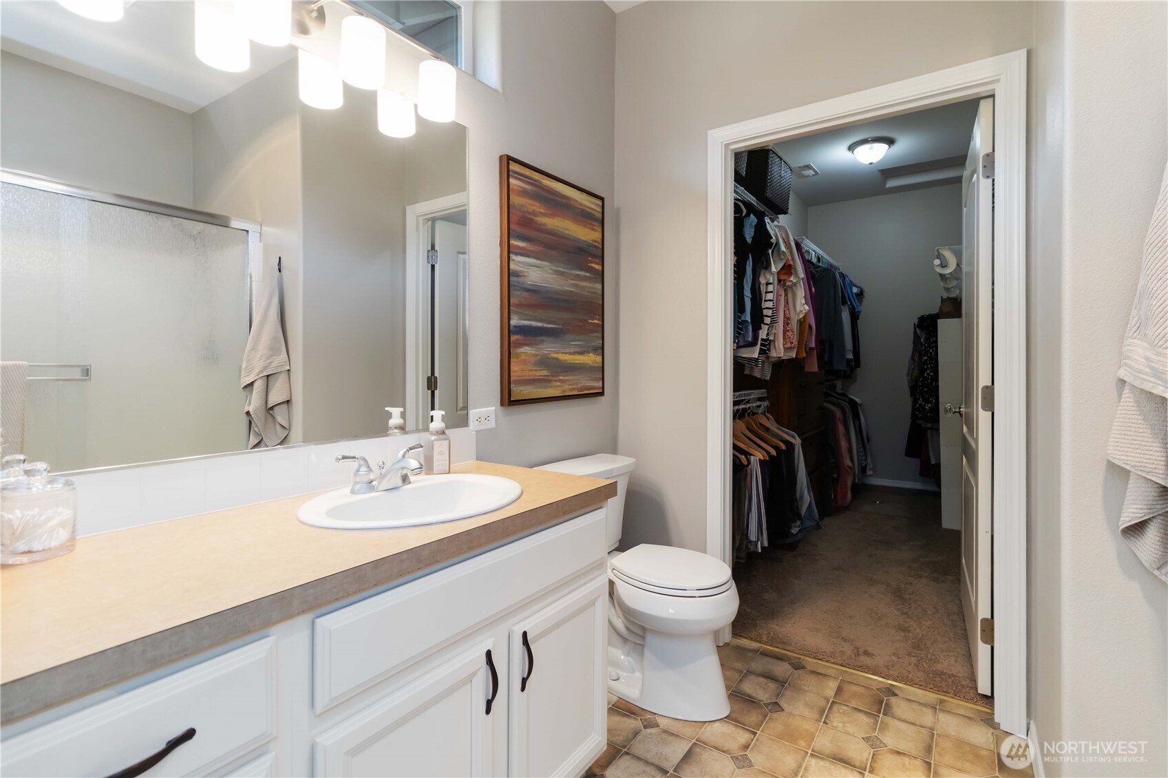 5558 Solo Point Drive Longview, WA 98632 - Photo 30 of 40 a bathroom with a sink a toilet and shower