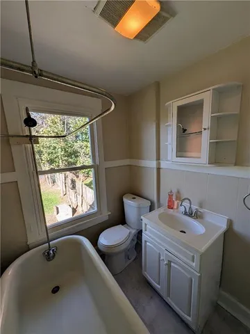 a bathroom with a sink and a toilet