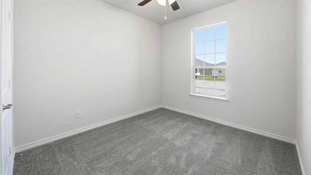 2104 Eugene Street Anna, TX 75409 - Photo 11 of 37 an empty room with a window