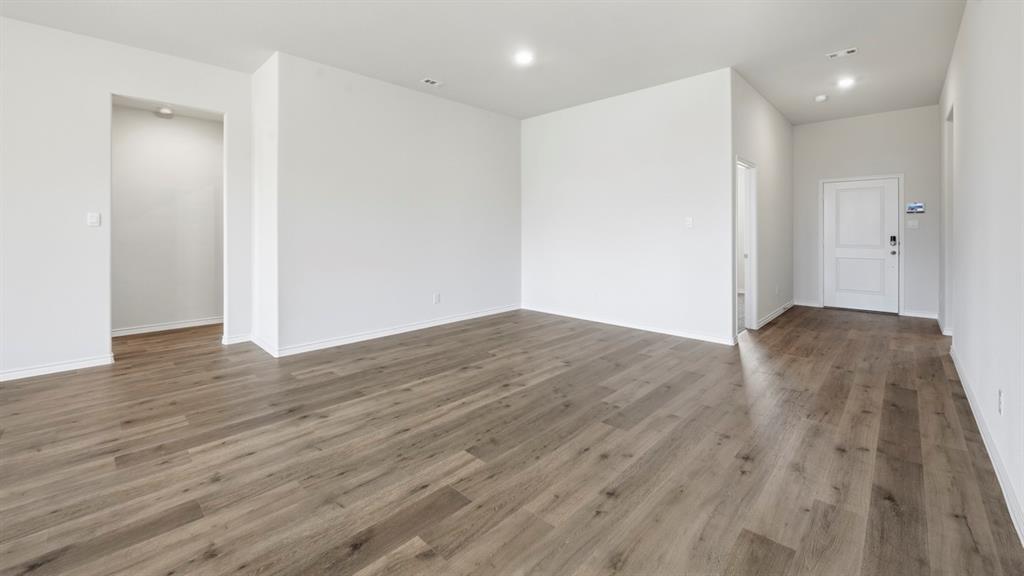 2104 Eugene Street Anna, TX 75409 - Photo 30 of 37 a view of hallway with wooden floor
