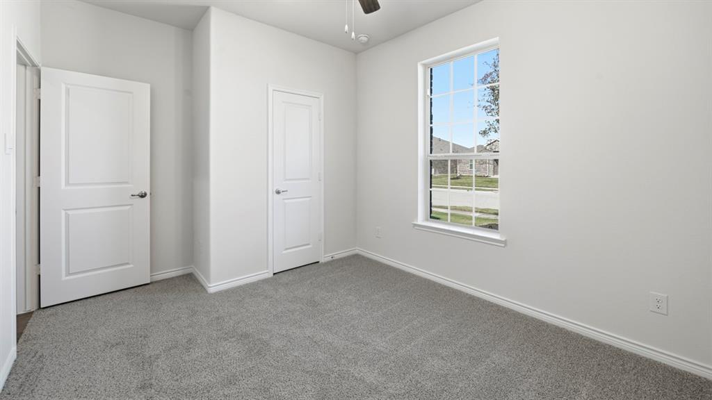 2104 Eugene Street Anna, TX 75409 - Photo 6 of 37 an empty room with windows