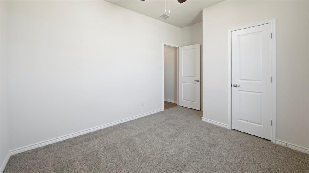 2104 Eugene Street Anna, TX 75409 - Photo 7 of 37 an empty room with closet area