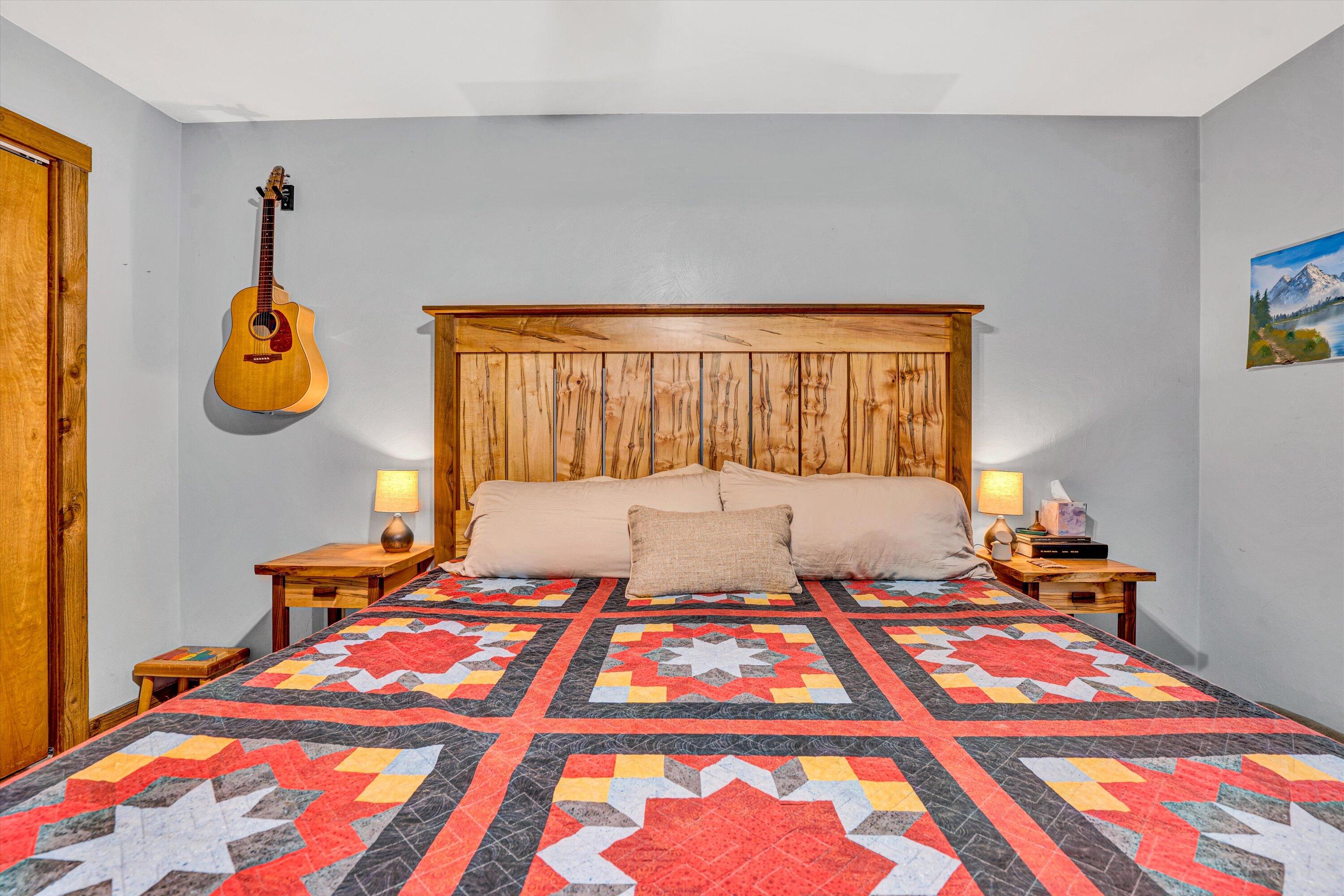 1033 Hickory Falls Road Blue Ridge, VA 24064 - Photo 24 of 52 a bedroom with a bed and wooden floor