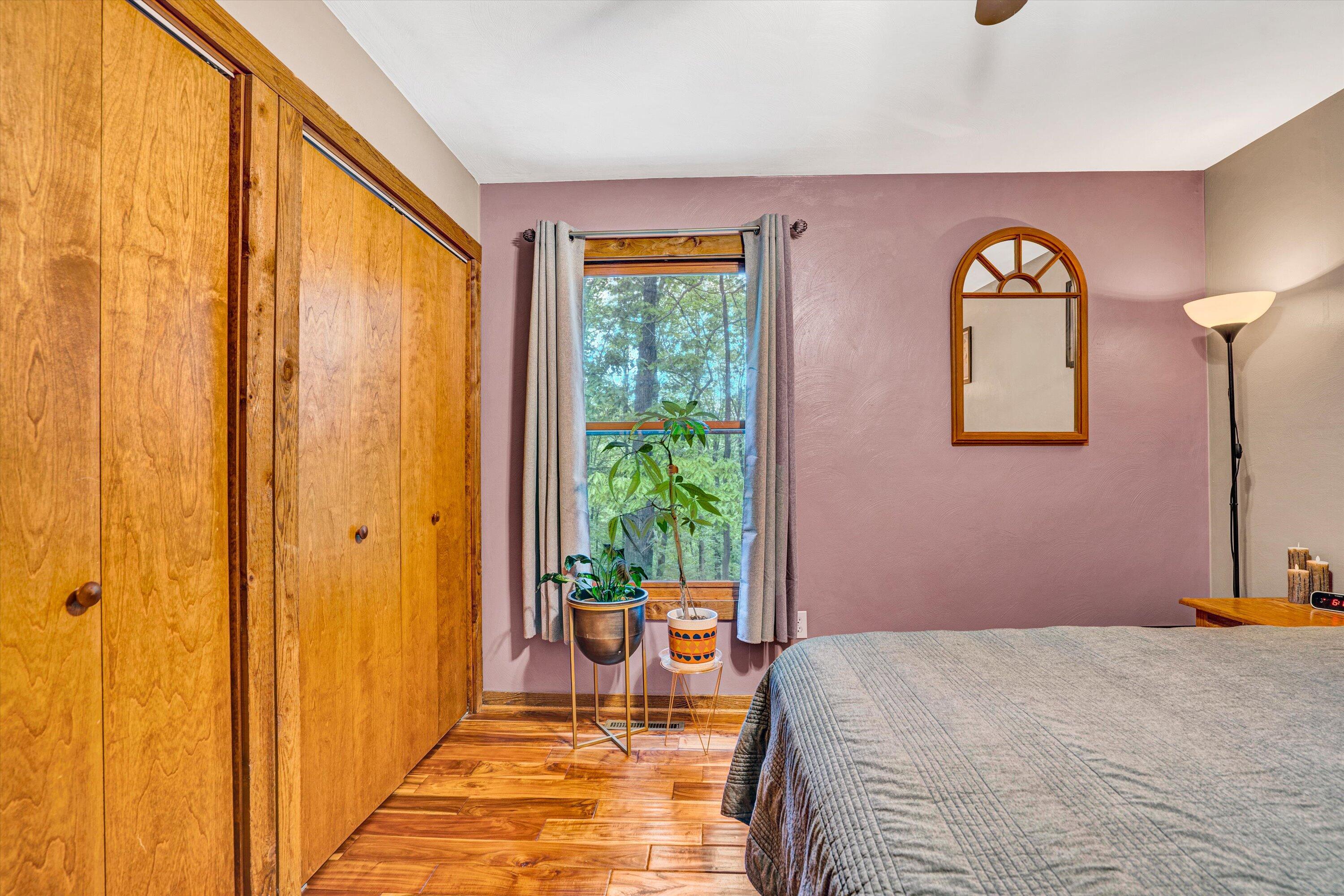 1033 Hickory Falls Road Blue Ridge, VA 24064 - Photo 29 of 52 a bedroom with a bed and window view