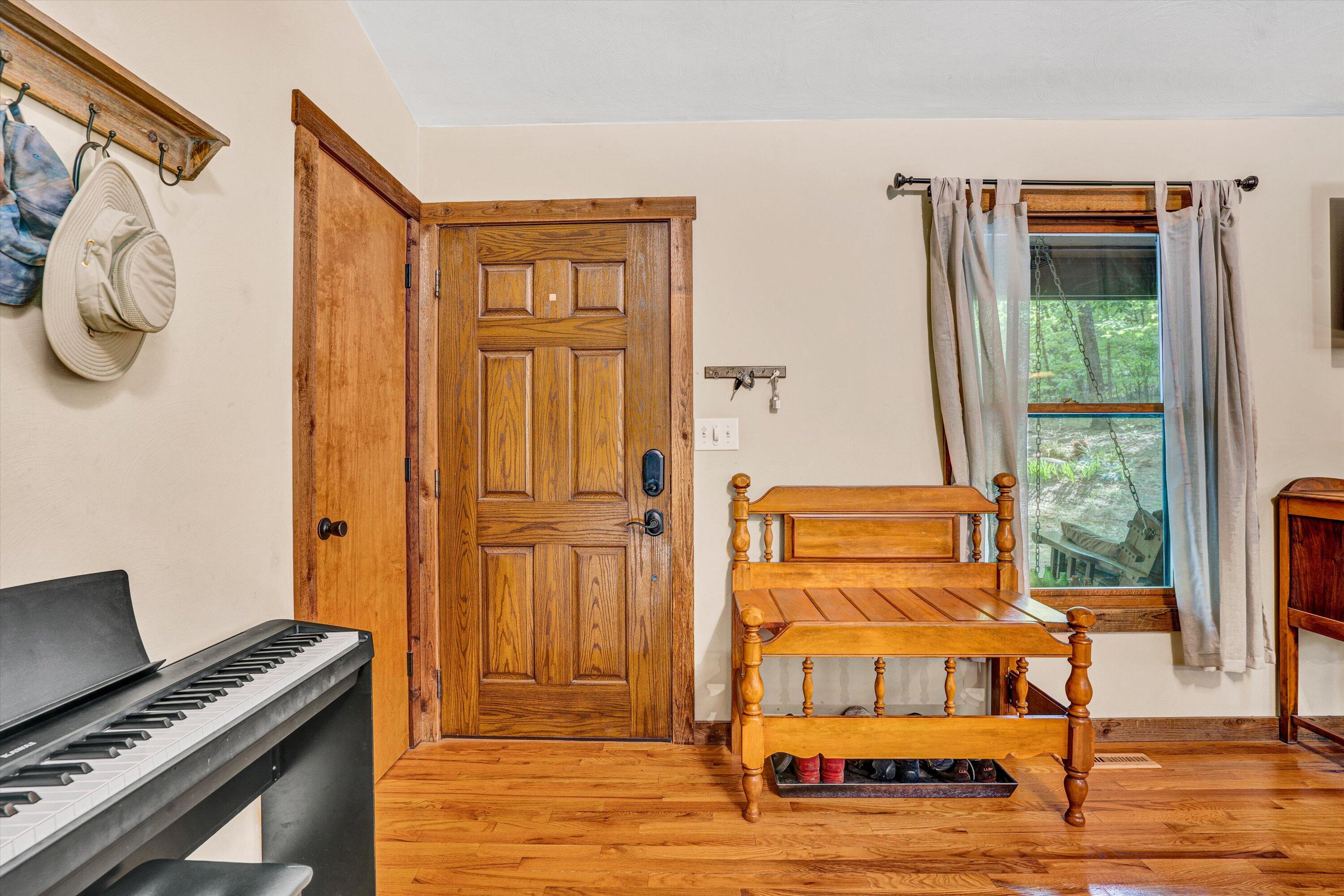 1033 Hickory Falls Road Blue Ridge, VA 24064 - Photo 4 of 52 a bedroom with a bed and a window