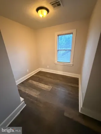 en empty room with windows