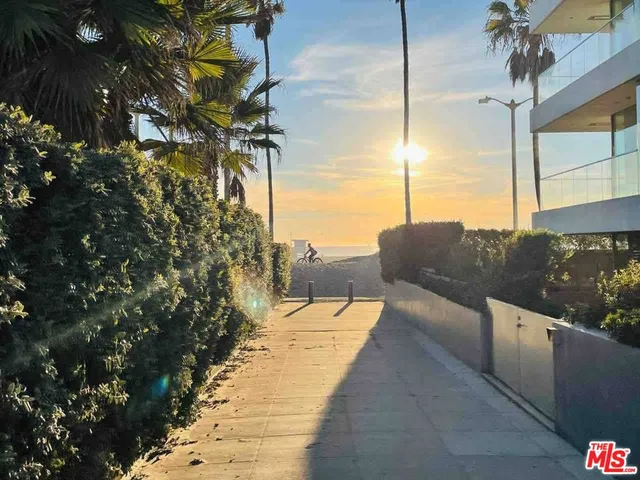 a bathroom with a tub sink toilet and mirror