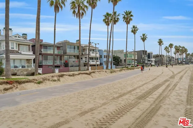 a front view of a house with a street