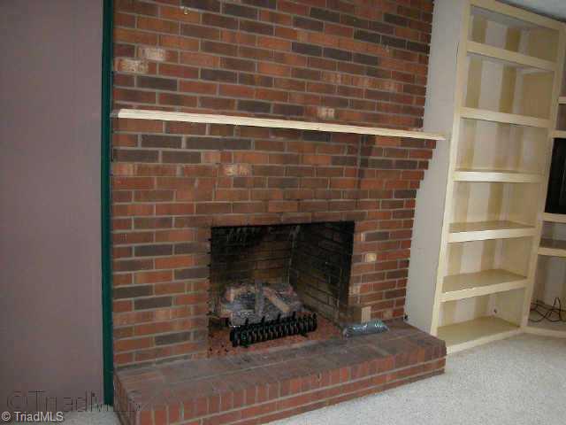 6325 Lochinvar Drive Rural Hall, NC 27045 - Photo 6 of 9 Other. Den gas log fireplace & built-in shelves w/TV space