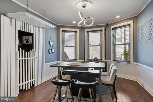 a kitchen with a stove and a refrigerator