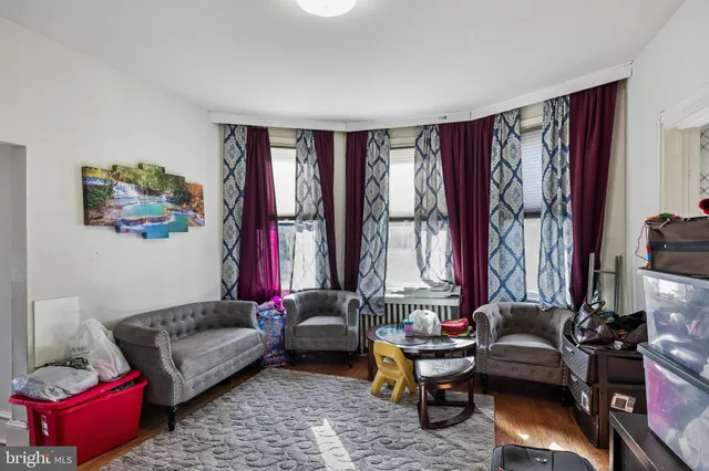 a kitchen with stainless steel appliances granite countertop a sink dishwasher a refrigerator and a microwave