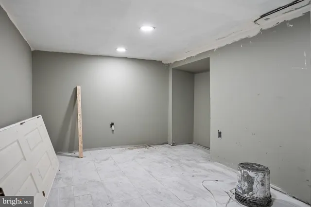 a view of a entertaining space with a table and chairs