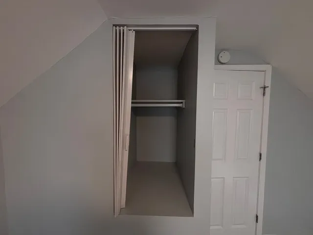 a view of a back yard of the house