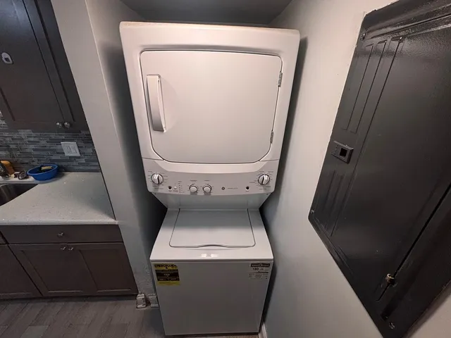 a utility room with dryer and washer