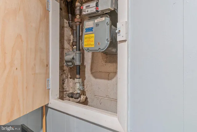 a view of a house with a yard porch and sitting area