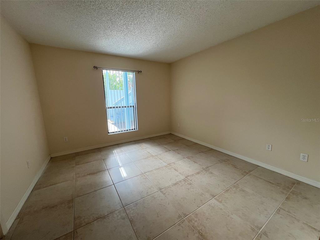 455 Alt 19, Unit 159 Palm Harbor, FL 34683 - Photo 20 of 26 a view of an empty room with a window