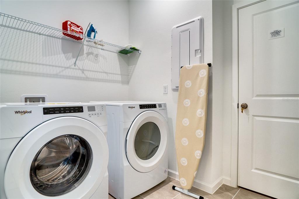 2341 Salty Winds Way Kissimmee, FL 34747 - Photo 20 of 79 a utility room with dryer and washer