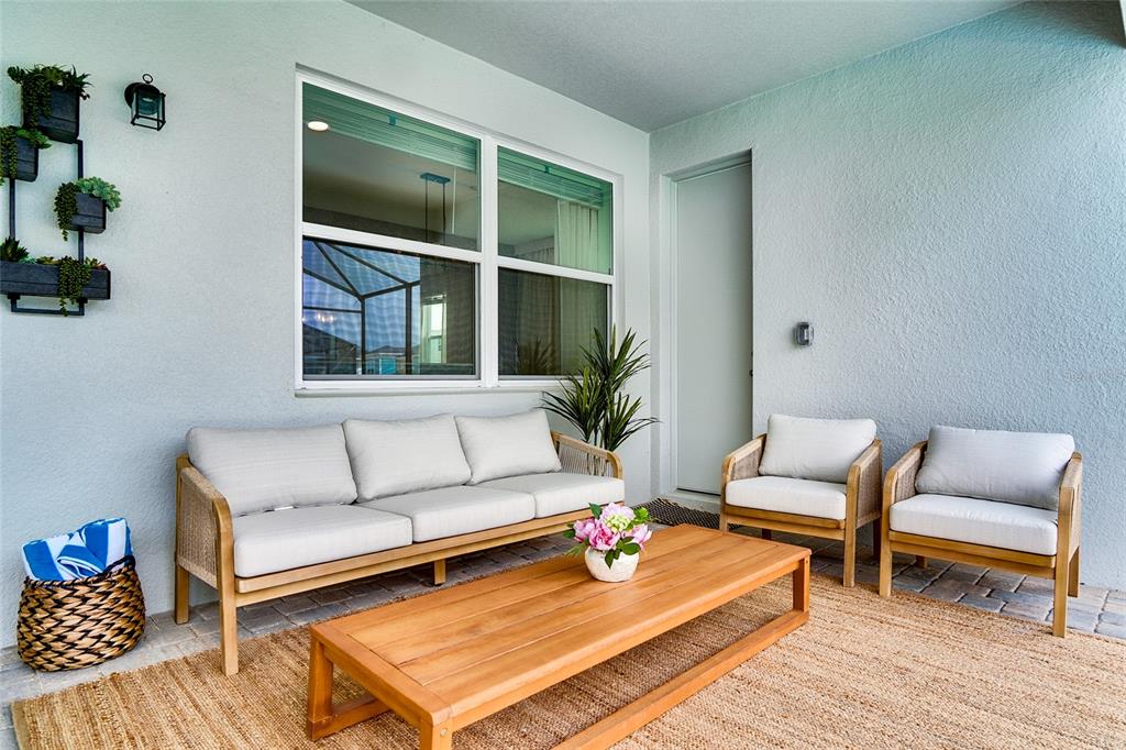 2341 Salty Winds Way Kissimmee, FL 34747 - Photo 26 of 79 a living room with furniture and a window