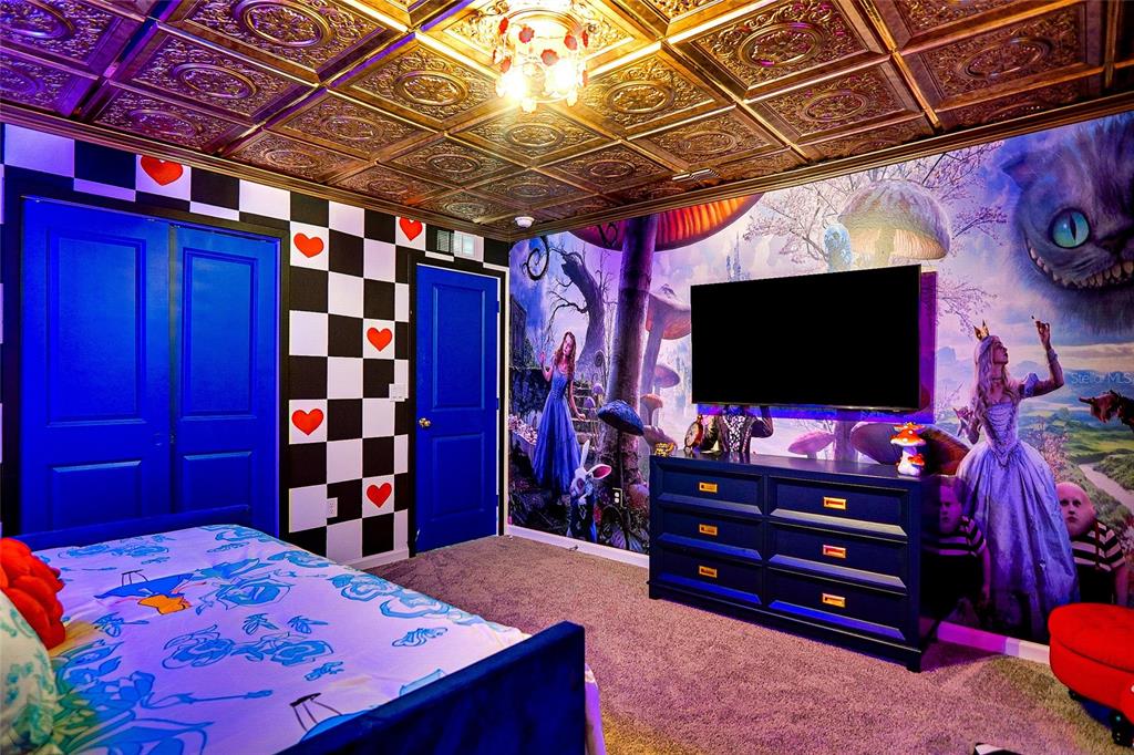 2341 Salty Winds Way Kissimmee, FL 34747 - Photo 43 of 79 a room with furniture and flat screen tv
