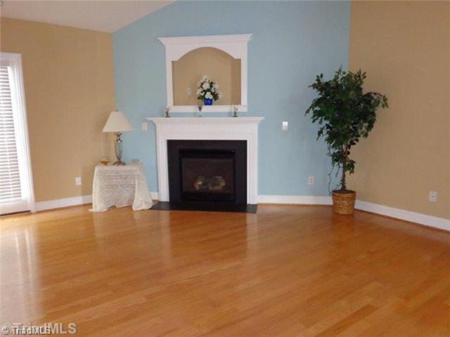 817 Ridge View Terrace Rural Hall, NC 27045 - Photo 4 of 14 Living Room. Beautiful hardwood floors and gas log fireplace