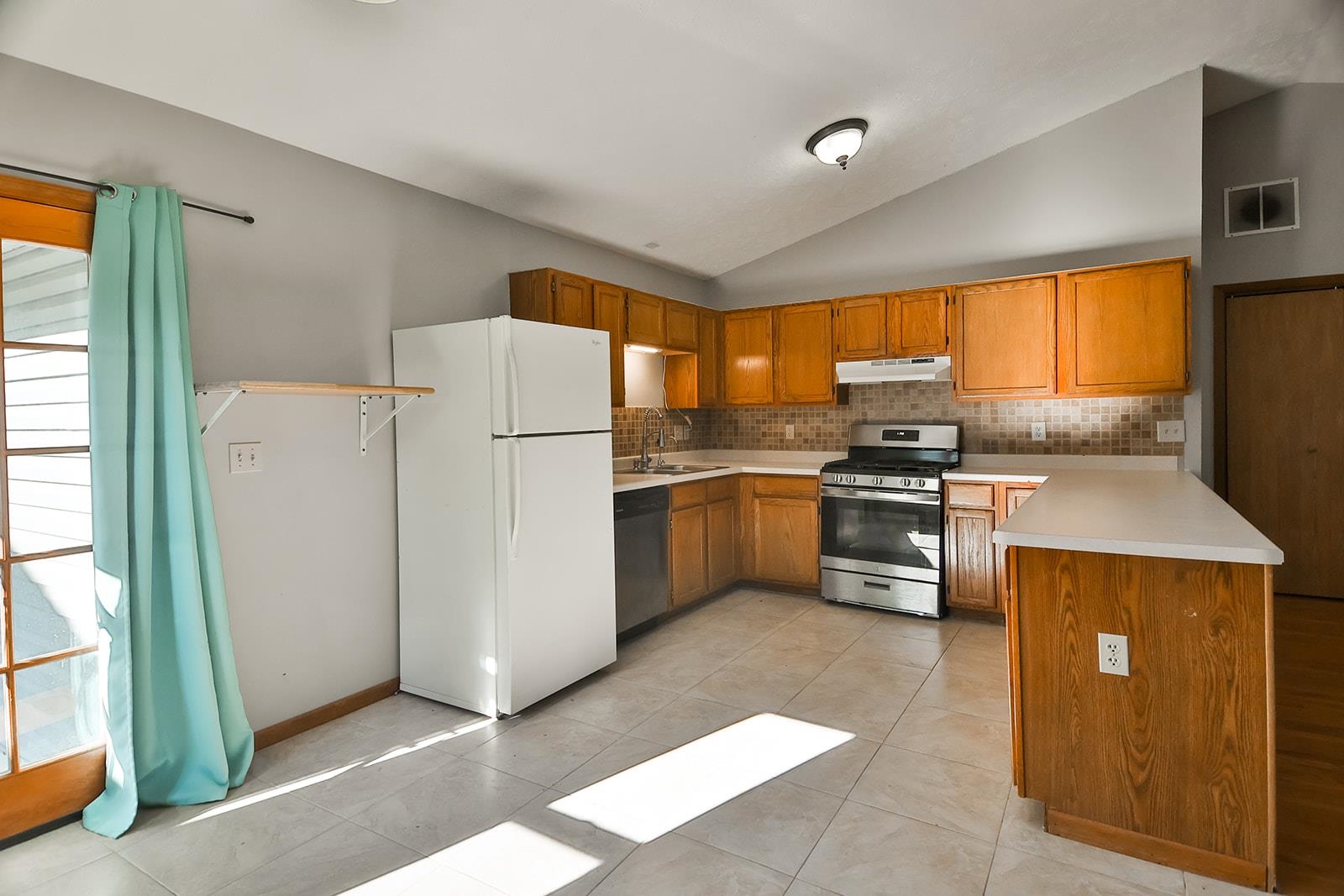 515 Pembroke Road Southwest Poplar Grove, IL 61065 - Photo 12 of 24 a kitchen with stainless steel appliances a refrigerator sink and cabinets