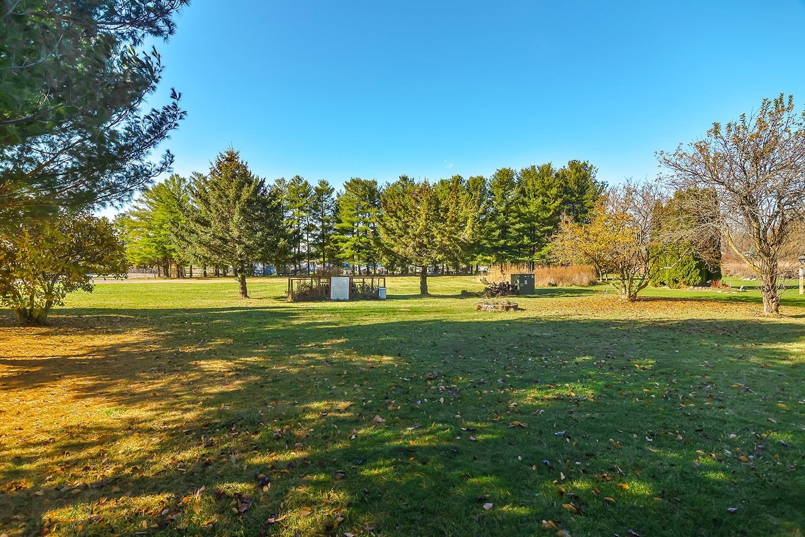 515 Pembroke Road Southwest Poplar Grove, IL 61065 - Photo 3 of 24 a view of field with trees