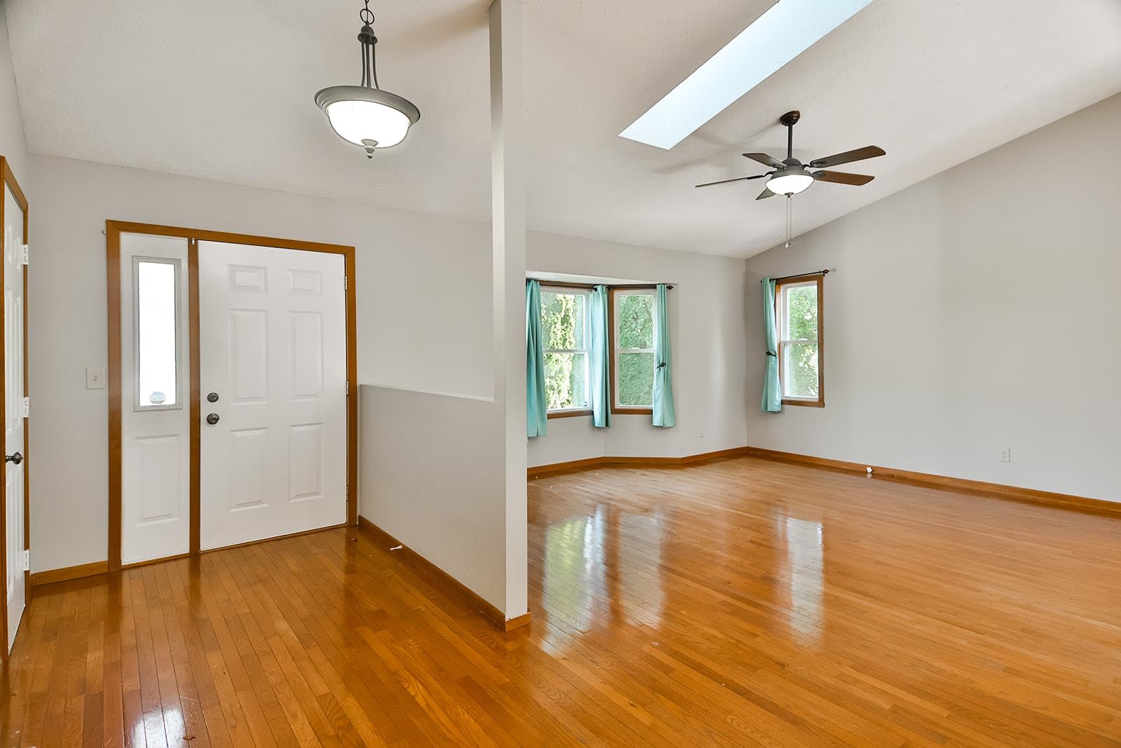 515 Pembroke Road Southwest Poplar Grove, IL 61065 - Photo 5 of 24 wooden floor in an empty room with a window