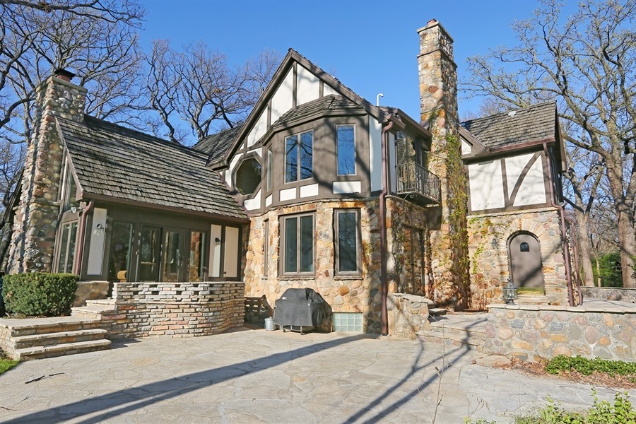 8100 South County Line Road Burr Ridge, IL 60527 - Photo 27 of 33 a view of a house with a snow on the road