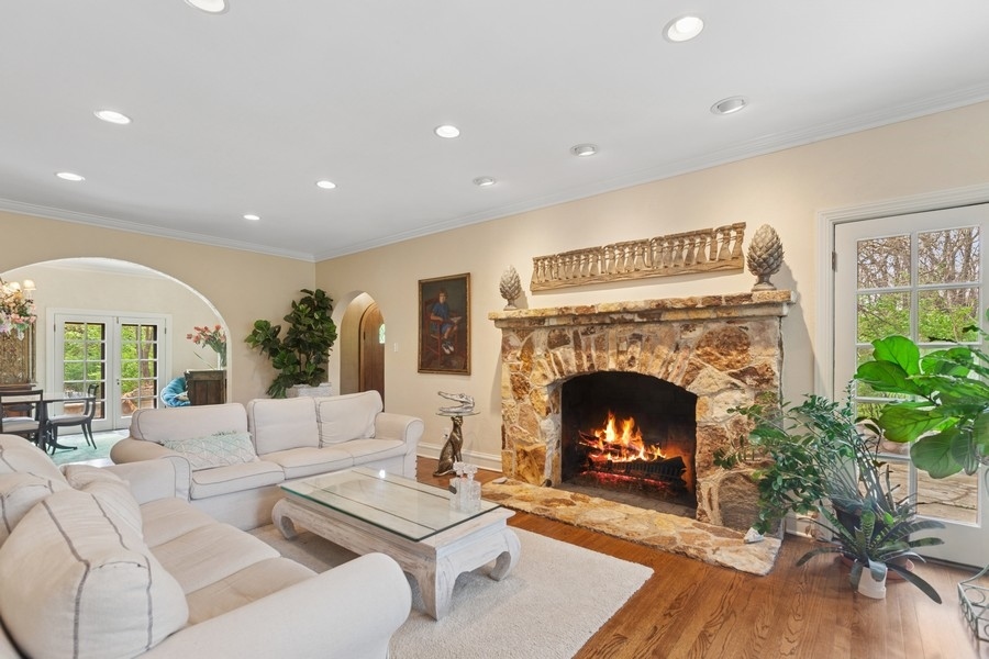 8100 South County Line Road Burr Ridge, IL 60527 - Photo 3 of 33 a living room with furniture and a fireplace