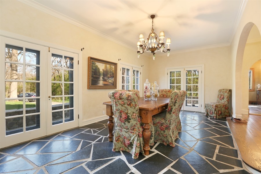 8100 South County Line Road Burr Ridge, IL 60527 - Photo 4 of 33 a view of a dining room with furniture and chandelier