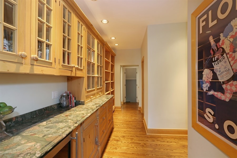 8100 South County Line Road Burr Ridge, IL 60527 - Photo 6 of 33 a view of a bathroom with a sink and a window